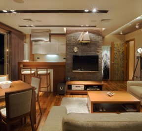Modern interior of an apartment with handmade furniture and lighting equipment.